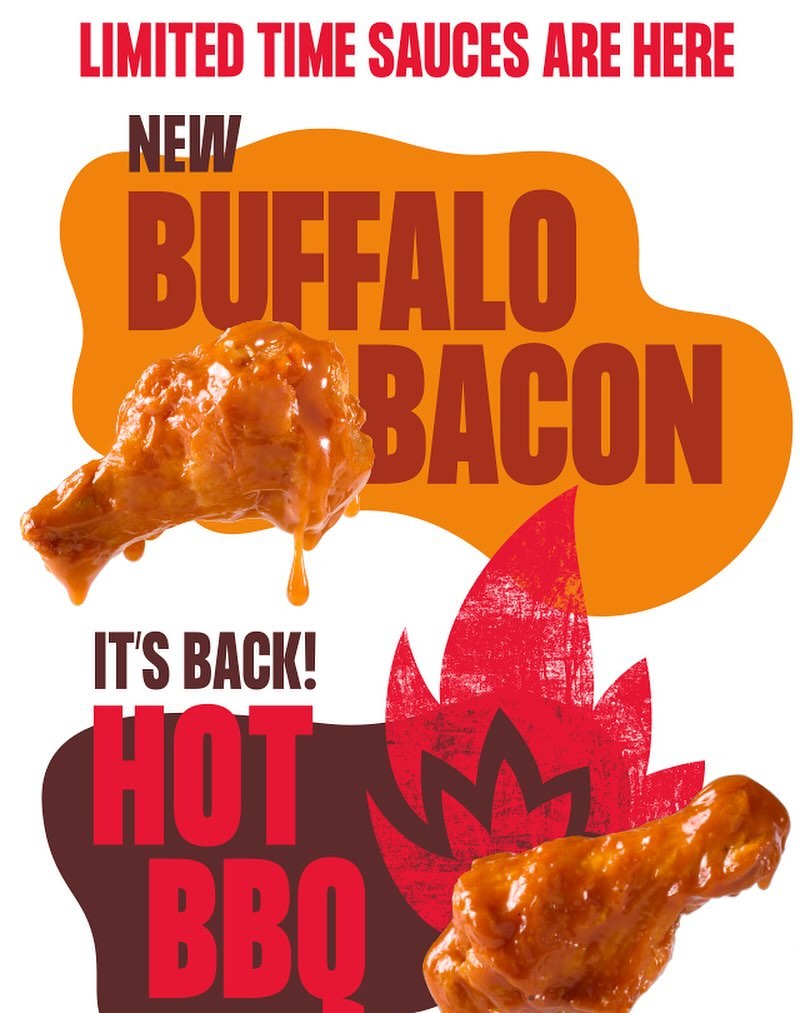 Buffalo Wild Wings hot BBQ sauce and Blazin’ Knockout wings served with fries, ranch dip, and bottled sauces on a wooden table